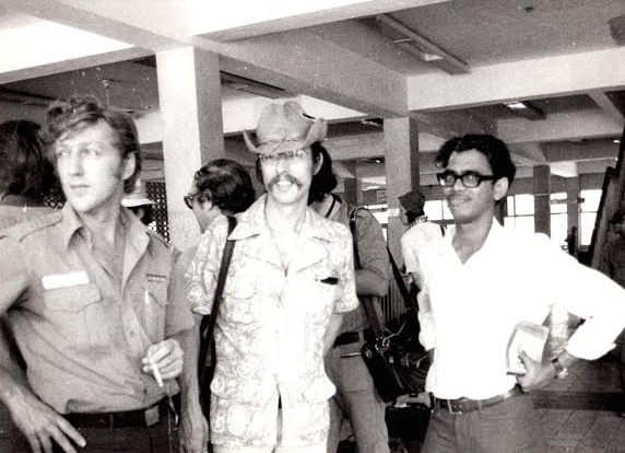 Nayan Chanda (on far right) along with fellow journalists Neil Davis (left) and Bernard Edinger (center) at Saigon's Tan Son Nhut airport at the end of May 1975.